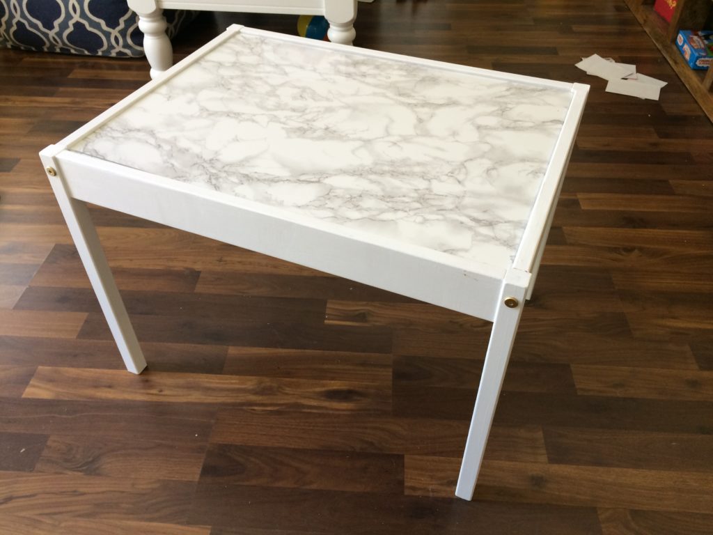 Covered the tabletop with marble con-tact paper