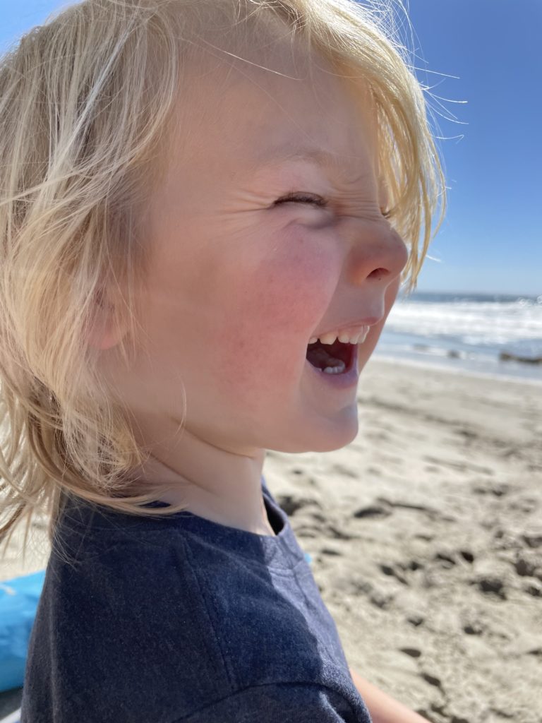 The littles goofing around on the beach