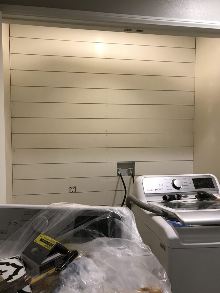 MDF primed shiplap installed and ready for filler and paint. 