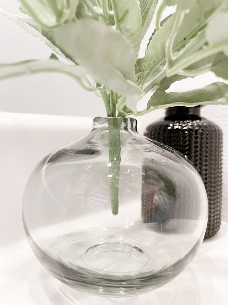 Bathroom makeover - A beautiful clear grey, round glass  vase, from hobby lobby. 