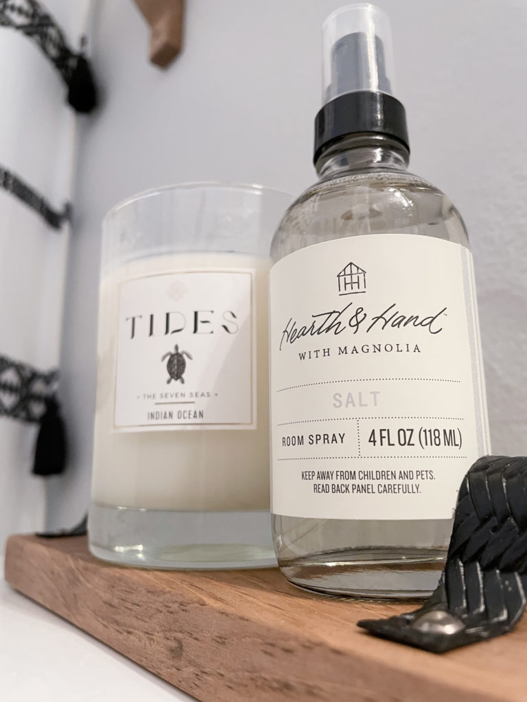 Closeup of the tray with the TIDES candle that smells the best! And Hearth & Hand room spray in Salt scent from Target.