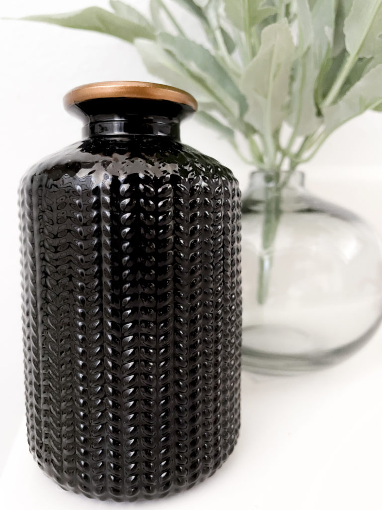 Bathroom makeover - Textured black and gold glass bottle from hobby lobby 